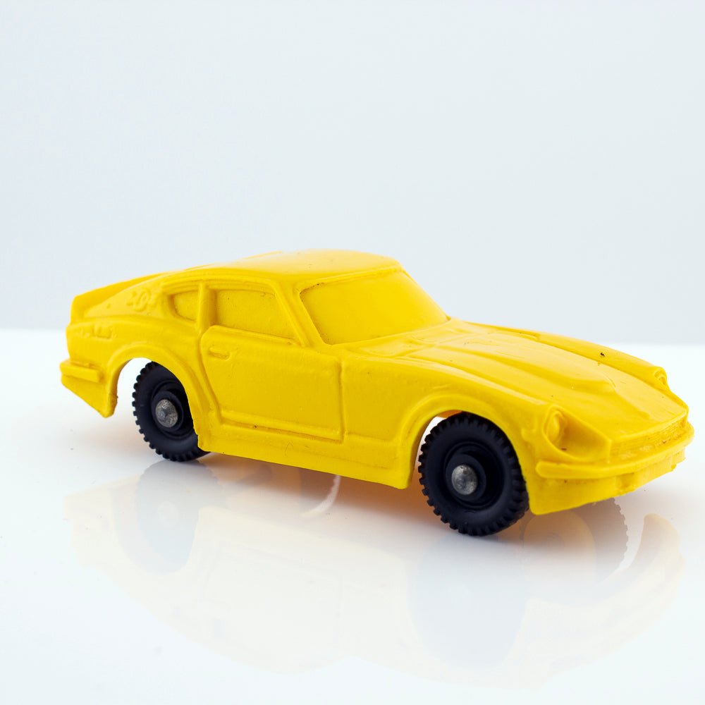Tomte Laerdal Norway, 28 Datsun 240Z 1973 Vintage Yellow Vinyl Plastic Model